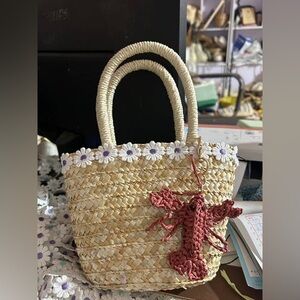 Woven Straw Tote Bag with Pink Lobster Charm